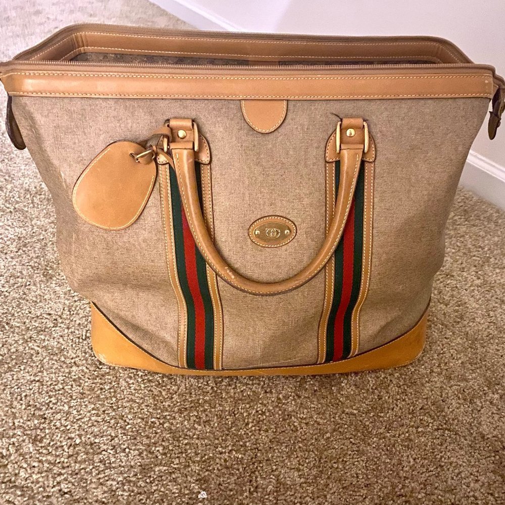 Gucci Travel bag great for carry on items at the airport as well!